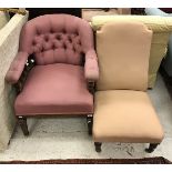 A circa 1900 upholstered button back salon armchair and a peach upholstered nursing chair on turned