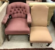 A circa 1900 upholstered button back salon armchair and a peach upholstered nursing chair on turned