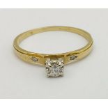 A 14 carat gold diamond set solitaire engagement ring, 2.