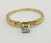 A 14 carat gold diamond set solitaire engagement ring, 2.
