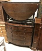 An early Victorian mahogany bow-fronted chest of two short over three long drawers,