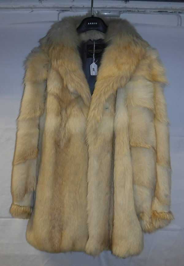 A cream fur jacket, size 40, bears label "Echter Peiz",