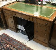 A late Victorian mahogany double pedestal desk,