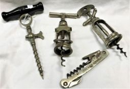 A collection of various corkscrews, bottle openers including a "The Wade Syndicate Barman's Friend",