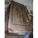 Two cardboard laundry boxes inscribed "Cadogan Laundry 52-56 Church Path Acton W4...
