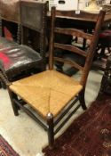 A 19th Century rush seated ladderback chair