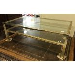 A modern Pierre Vandel of Paris brass framed bevel glazed two tier coffee table