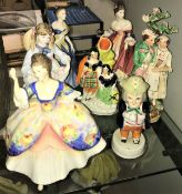 A collection of various figurines including Royal Doulton "Christine" (HN2792), "Adrienne" (HN2304),