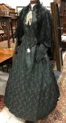 A Victorian dark green silk two piece day dress,