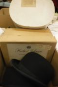 A Lock & Co. black bowler hat, an S.