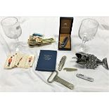 A Wenger penknife, a collection of corkscrews and bottle openers,