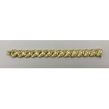 An 18 carat gold bracelet with square links, each set with diamonds,