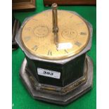 A 19th Century painted lead cased octagonal table clock,