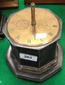 A 19th Century painted lead cased octagonal table clock,