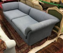 A modern blue fabric upholstered sofa in the Beaumont Fletcher style by Peter Green of Battersea,