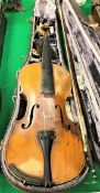 A vintage violin with single piece pine front and single piece plain maple back,