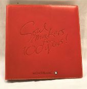 A blank Mont Blanc red leather notepad holder,