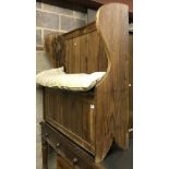 A modern pine tavern type wing sided hall settle