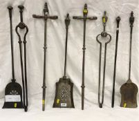 A collection of eight 18th/19th Century steel fire irons