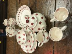 A collection of Emma Bridgewater "Red Star" pattern dinner / tea wares including teapot, cream jug,