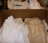 Two boxes of vintage textiles relating to babies and young children to include Christening gowns,