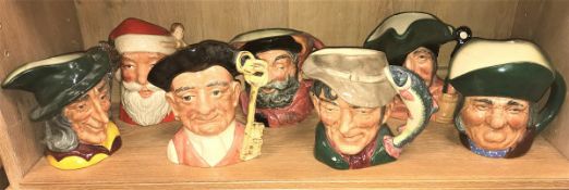 A collection of large Royal Doulton character jugs comprising "Santa Claus" (D6668),