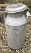 A galvanised milk churn stamped "United Dairies Cream Wud Buckingham" and marked "Manufactured by