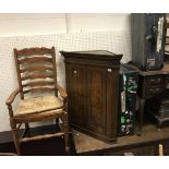 A Victorian painted pine single door corner cabinet with two plain shelves,