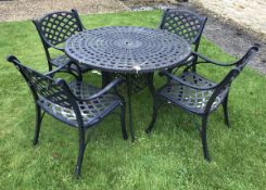 A metal garden table and chairs