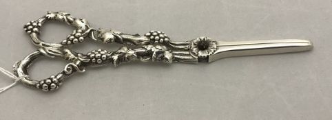 A pair of Victorian silver grape scissors (by George Adams, London 1867), 4.