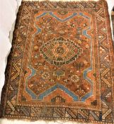 A Belouch prayer rug, the central panel set with tiled decoration,