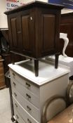 A painted bow-fronted chest of two short over four long drawers, dressing table,