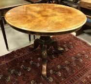 A Victorian walnut centre table, the burr quartered top with moulded edge,