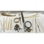A box of assorted costume jewellery, to include brooches, bangles, etc,