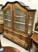 A 19th Century Dutch marketry inlaid display cabinet the upper section with moulded cornice over