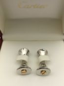 A pair of Cartier Santos cufflinks in silver,