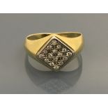 A gentleman's 18 carat gold and diamond set ring, approx 5.
