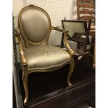 A modern French Hepplewhite design giltwood framed elbow chair,