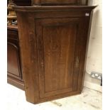 A 19th Century oak corner cupboard