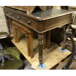 A Victorian mahogany two drawer writing table