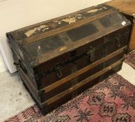 A Victorian dome top strapwork trunk bearing painted name "AM Bowler" and bearing various GWR