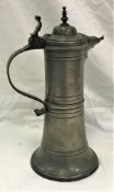 A 19th Century Dutch pewter lidded jug or flagon,