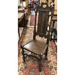 An oak panel seated chair in the 17th Century manner,