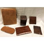 A vintage crocodile skin covered card case, three various crocodile wallets,