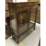 A modern mahogany display cabinet, together with two vintage pine towel rails,