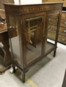 A modern mahogany display cabinet, together with two vintage pine towel rails,