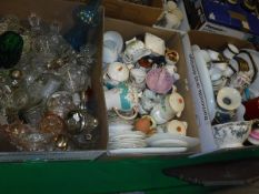 Two boxes of assorted glassware to include candlesticks,