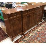 A modern burr walnut veneered breakfront side cabinet in the George III taste,