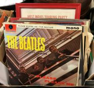A box containing various LPs including The Beatles "With The Beatles",
