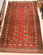 A collection of three Bokhara tribal rugs, approx 158 cm x 94 cm,